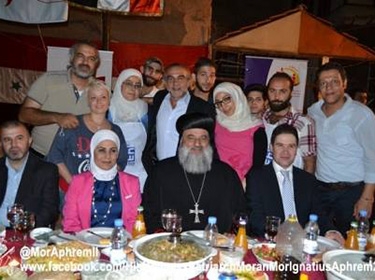 وزير السياحة في إفطار خيري للأيتام والمحتاجين برعاية البطرك أفرام الثاني